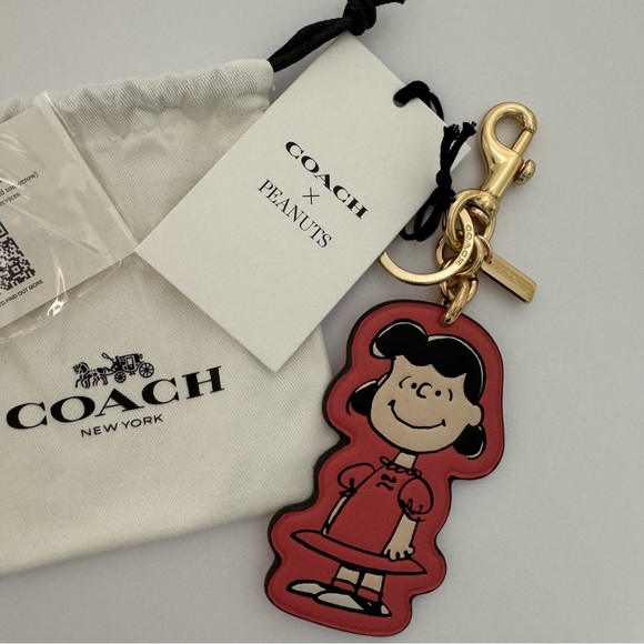 Coach Accessories - Coach X Peanuts Lucy Bag Charm Key Chain CBG58 75th Anniversary Limited Edition